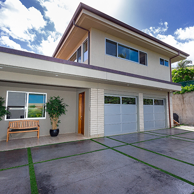 image of aluminum garage door on luxury home from Raynor.